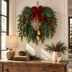 Christmas cedar wreath on a wall above an entryway console